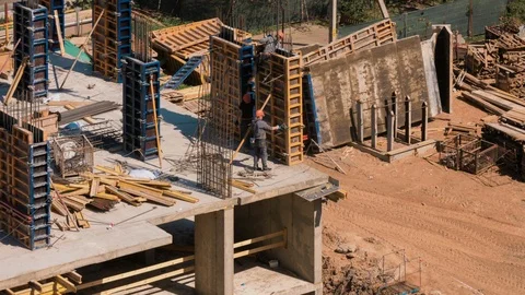 Constructors at construction site residential workers work with steel rebar Vídeos de archivo 108112426