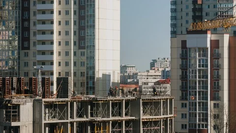 Constructors working at construction site residential housing estate building Stock Footage 105187751