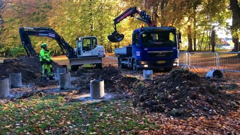 Constrution work in autumn forest Stock Footage 142254405