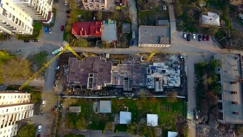 Constuction crane on buildings with builders Stock Footage 74127028