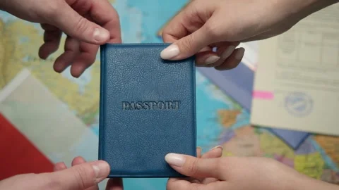 Consular worker hands Polish passport to immigrant among approved documents and Stock Footage 331263153
