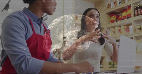 Consultant explaining concept in retail activating holographic brain while Stock Footage 312415698
