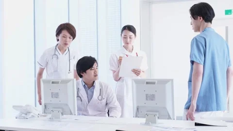 Consulting Doctors and Nurses Stock Footage 332751584