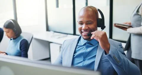 Consulting, man or computer with headset in call center for inbound assistance Stock Photos