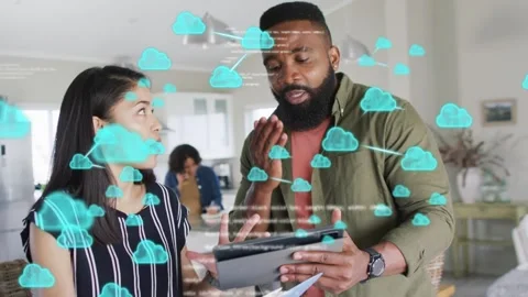 Consulting tablet and docs, woman, man animating turquoise cloud and code around Stock Footage 333975669