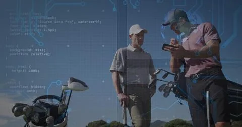Consulting two men in polos tapping GPS on fairway, with golf bag, clubs and AR Stock Photos