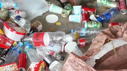 Consumer trash, plastic packaging, business containers, logo labels Stock Footage 306034849