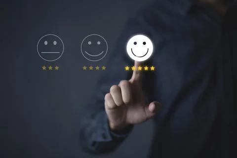 Consumers are evaluating their satisfaction with the service. Consumers write Stock Photos