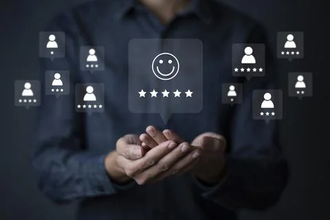 Consumers are evaluating their satisfaction with the service. Consumers write Stock Photos