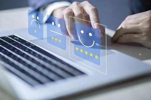 Consumers are evaluating their satisfaction with the service. Consumers wri.. Stock Photos