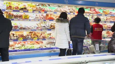 Consumers shopping in supermarket Stock Footage 24695945
