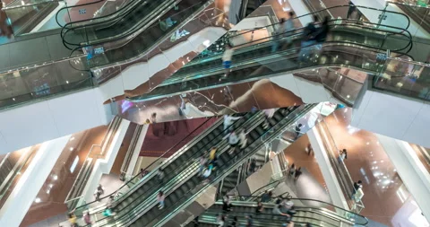 Consumption concept. Time lapse. Customers clients moving on escalator Stock Footage 140075867