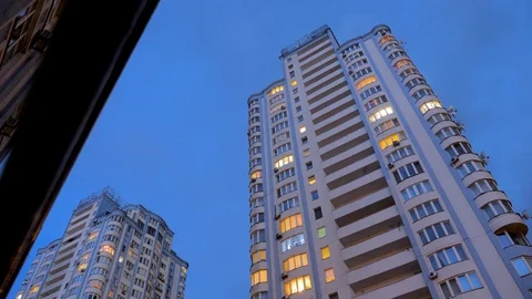 Consumption of electroenergy, electricity. Lights in the windows turning on and Stock Footage 112224446