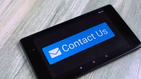 Contact button on tablet Stock Footage 69861542