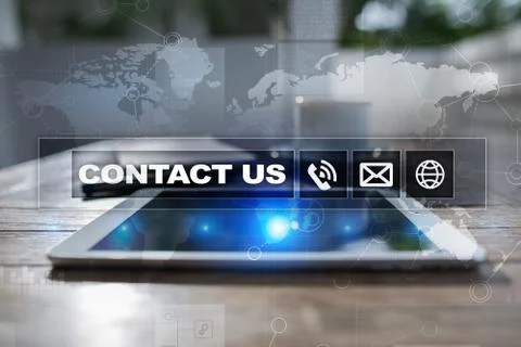 Contact us button and text on virtual screen. Business and technology concept. Фото