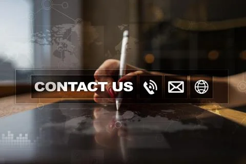 Contact us button and text on virtual screen. Business and technology concept. Stock Photos