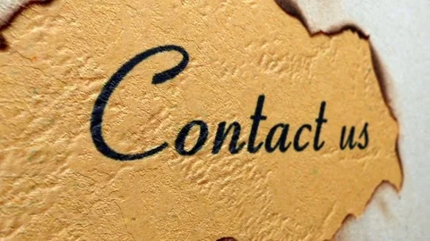 Contact us text on paper hole Stock Footage 81584482