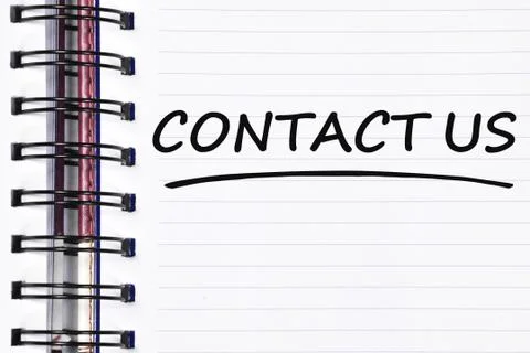 Contact us words on spring note book Stock Photos
