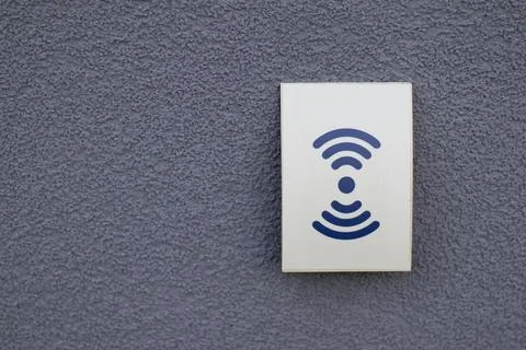 Contactless access card reader on a gray wall Stock-Fotos