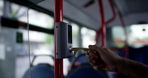 Contactless Brass Tool Pressing Stop Button in Public Bus, Interior Handheld Stock Footage 341327996