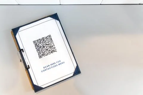 Contactless menu with QR code on table, with new normal.  QR code edited and  Stock Photos