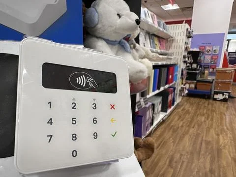Contactless mobile payment machine in the store Stock Photos