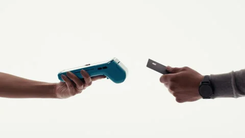 Contactless payment being made with a credit card on a blue terminal Stock Footage 317611631