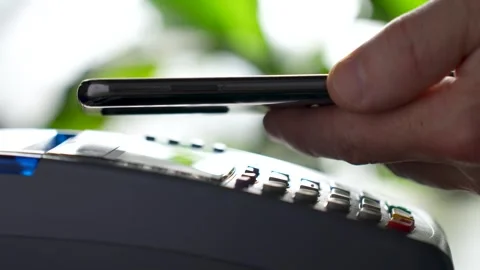 Contactless payment by NFC technology mobile phone, 4k slow motion Stock-Footage 254339688