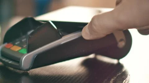 Contactless payment with smartphone with NFC technlogy. Stock Photos