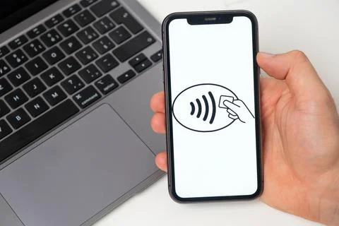 Contactless payment system allows to make money transfers. Online shopping with Stock Photos