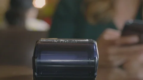 Contactless payment using card terminal and phone Stock Footage 92412613