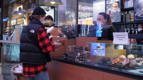 Contactless public dining services amid coronavirus restrictive measures. Woman Stock Footage 144874713