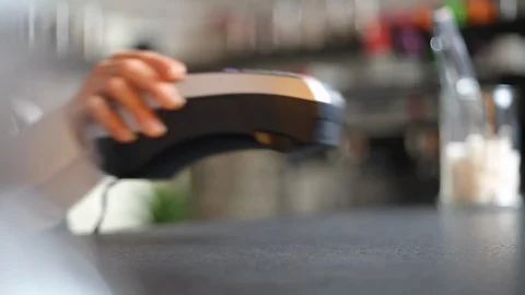 Contactless technology for accepting payments to a smartphone through the NFC.  Stock Footage 119820262