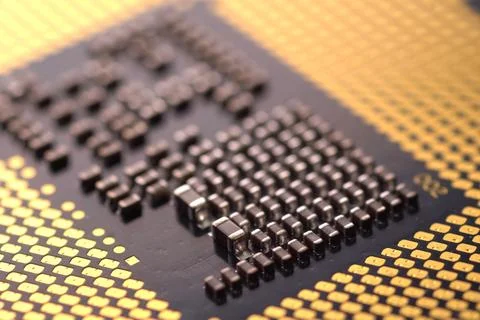 Contacts on the surface of central processor. Elements of electr Stock Photos
