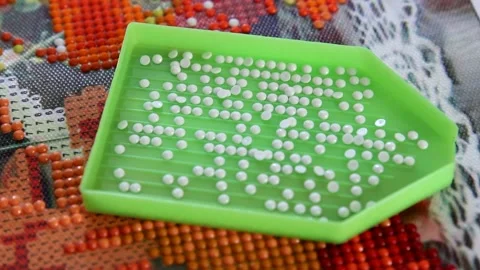 Container with acrylic rhinestones Stock Footage 159949362