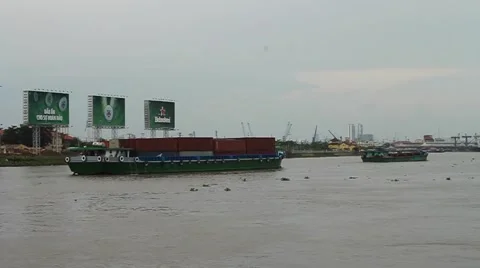 Container Barges Move Down River in Ho Chi Minh City, Vietnam Stock Footage 44418727