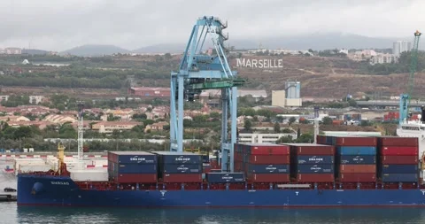 Container being loaded on Container ship at Marseille, France on 27 August 2023 Stock Footage 249682936
