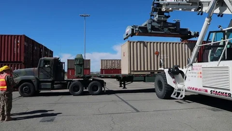 Container being Loaded on convoy during Port Operations - 2018 Stock Footage 104781346