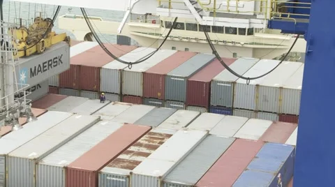 Container being swung across ship Stock Footage 1079265