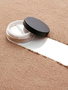 A container with blush for makeup. blush for the face. Stock Photos