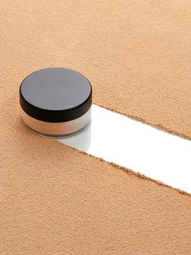 A container with blush for makeup. blush for the face. Stock Photos