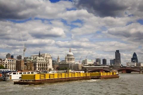 Container boat on river thames Stock Photos
