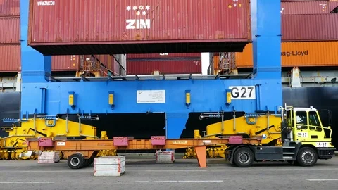 Container cargo freight ship in shipyard with working crane Stock Footage 92591631