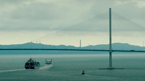 Container Cargo freight ship was passing under the Incheon Bridge 스톡 동영상 125425996