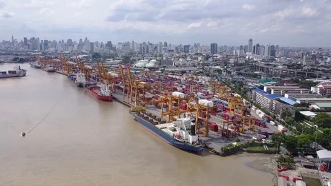 Container Cargo freight ship with working crane loading bridge in shipyard Free Stock Footage 81169504