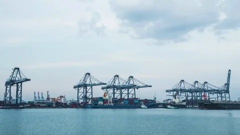 Container Cargo freight ship with working crane loading bridge in shipyard. Stock Footage 112703741