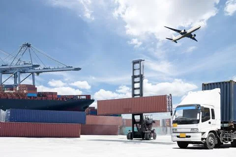 Container Cargo freight ship with working crane bridge in shipyard Stock Photos