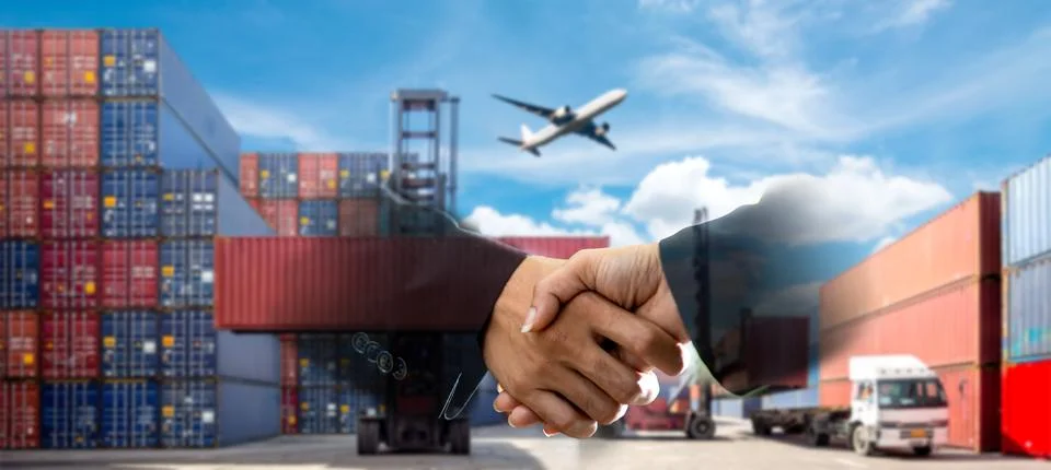 Container Cargo freight ship with working crane bridge Stock Photos