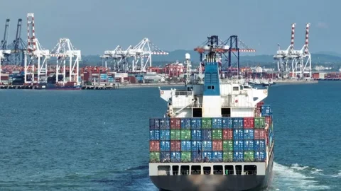 Container cargo ship boat in the open sea Freight shipping maritime. with port Stock-Footage 336445601