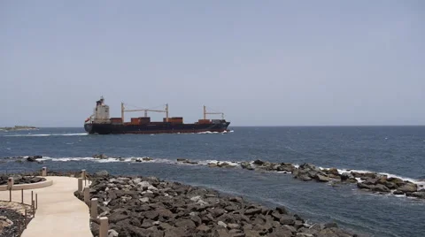 Container cargo ship heading to high seas 2 Stock Footage 50946634